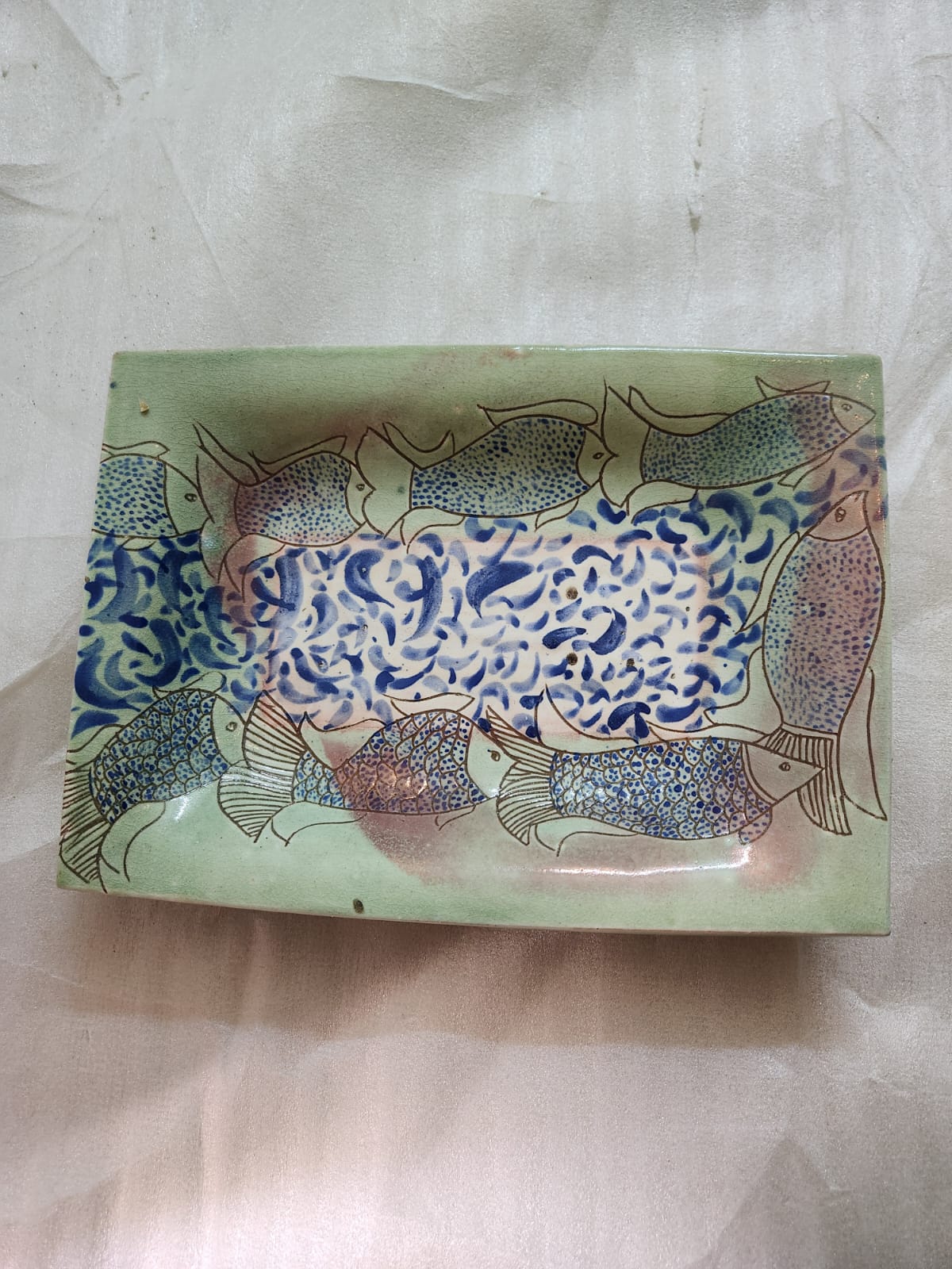 A rectangular lusterware dish