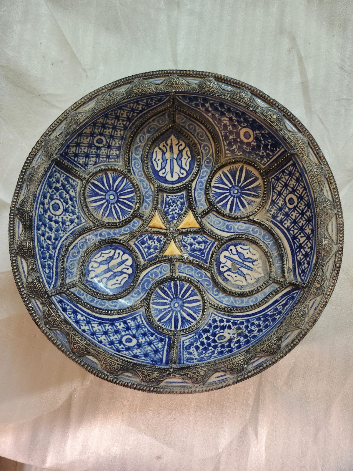 Large white metal-mounted blue