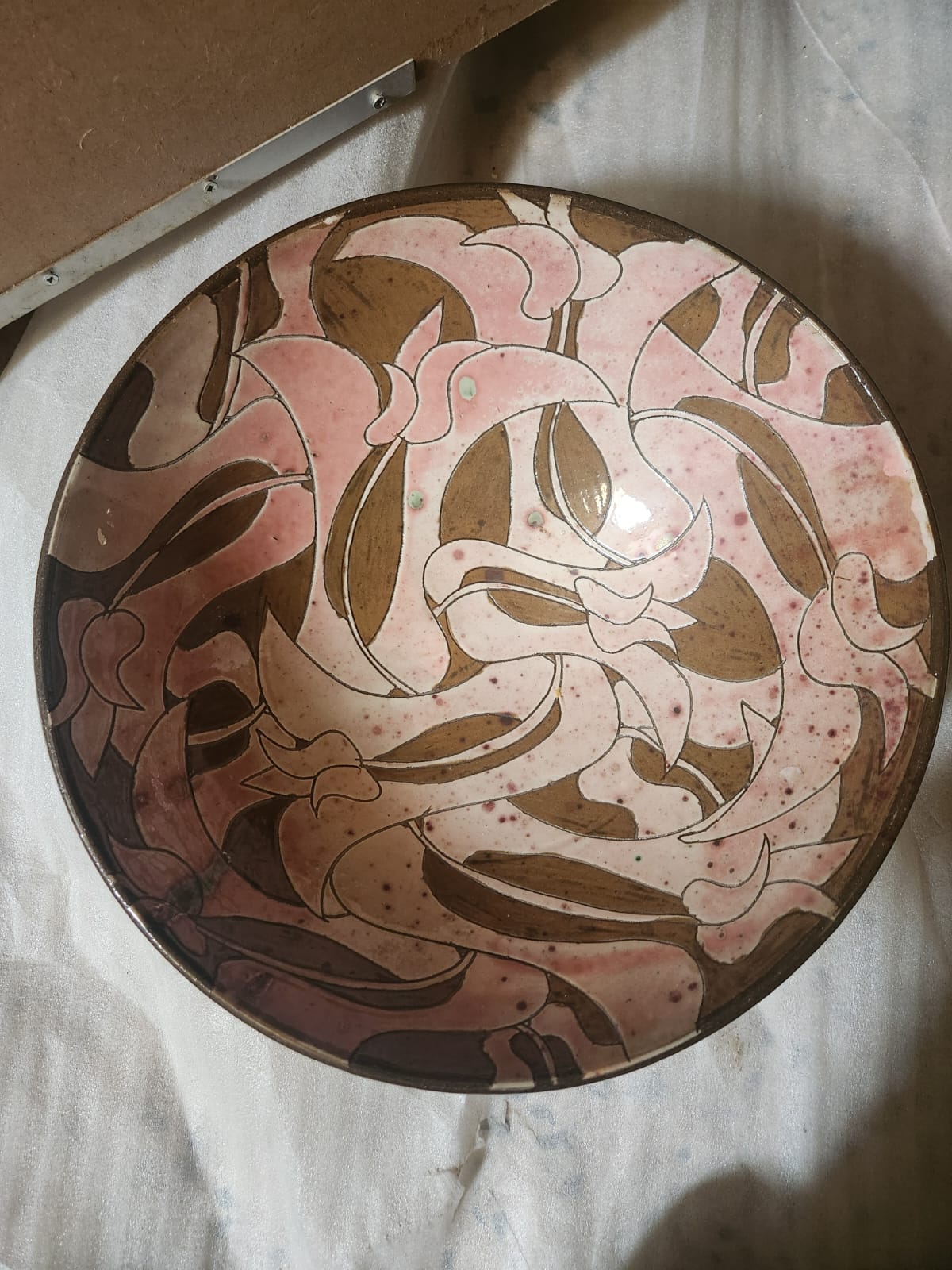 Pink and brown ceramic plate