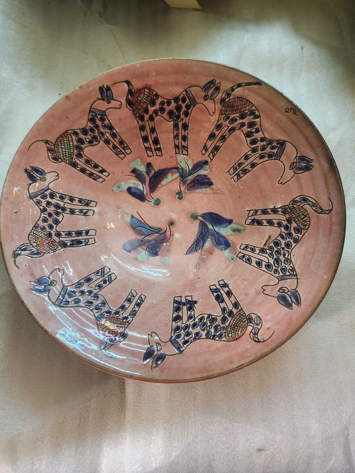 Pink lusterware ceramic plate